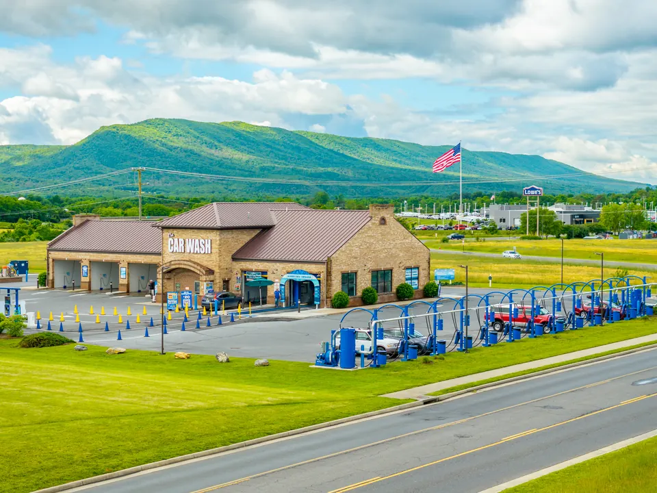 Aerial view of Woodstock Car Wash with the Shenandoah Valley behind